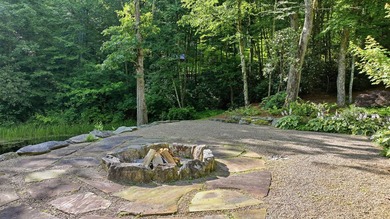 Perched on 1.12 private acres, this custom-built Timbercraft - photo 31