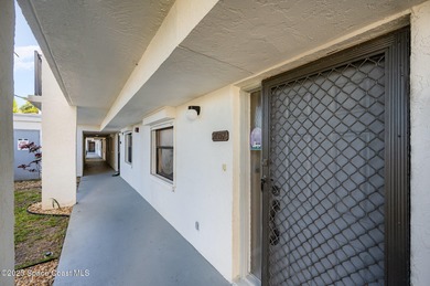 (private lake, pond, creek) Condo For Sale in Cocoa Beach Florida