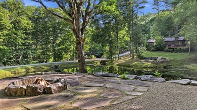 Perched on 1.12 private acres, this custom-built Timbercraft - photo 32