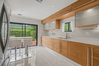 Beautifully remodeled 2,800 SF two-story residence featuring a - photo 4