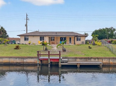 PORT CHARLOTTE!! 2 BEDROOM, 2.5 BATH, 2-CAR GARAGE WATERFRONT - photo 32