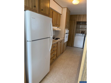 55+ Community. Well maintained, spacious home. Lots of storage