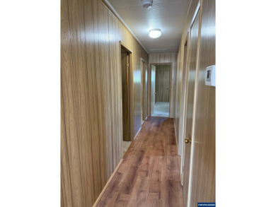 55+ Community. Well maintained, spacious home. Lots of storage