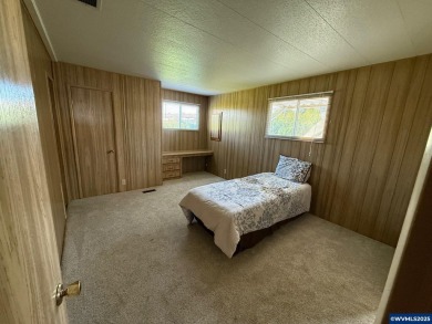 55+ Community. Well maintained, spacious home. Lots of storage