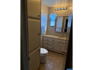 55+ Community. Well maintained, spacious home. Lots of storage