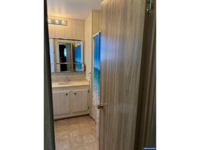 55+ Community. Well maintained, spacious home. Lots of storage