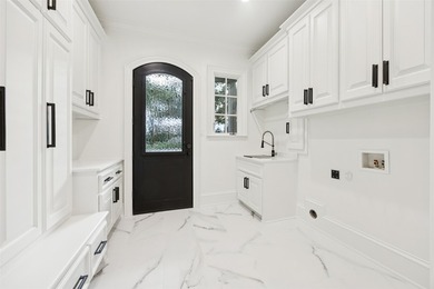 This gorgeous, fully updated home in the prestigious gated and - photo 31