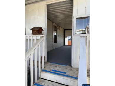 55+ Community. Well maintained, spacious home. Lots of storage