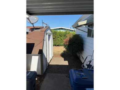 55+ Community. Well maintained, spacious home. Lots of storage