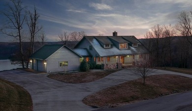 This exquisite custom home built on 2.2+/- acres is a secluded - photo 3