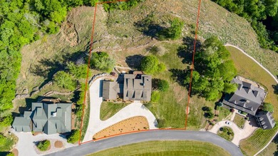 This exquisite custom home built on 2.2+/- acres is a secluded - photo 10