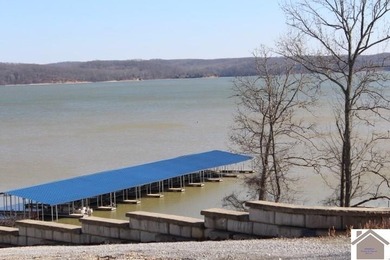 1.55 acres - waterfront - wooded lot with deeded boat slip in a - photo 4