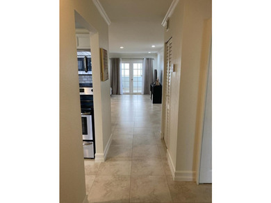 WELCOME TO THIS BEAUTIFULLY UPDATED 2 BEDROOM, 2 BATH VILLA IN - photo 2