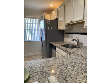 WELCOME TO THIS BEAUTIFULLY UPDATED 2 BEDROOM, 2 BATH VILLA IN - photo 6