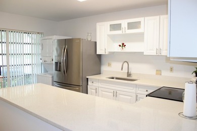 Remodeled Villa 2/1 in the desirable 55+ Boca Lakes Condominium - photo 2