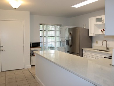 Remodeled Villa 2/1 in the desirable 55+ Boca Lakes Condominium - photo 4