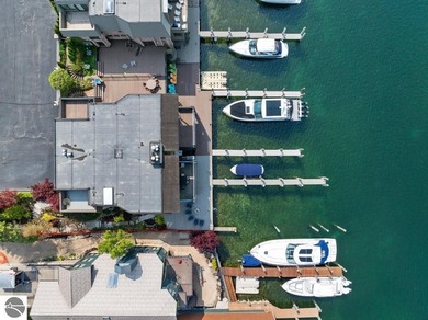 Walking distance to Downtown Charlevoix, this four-story - photo 2