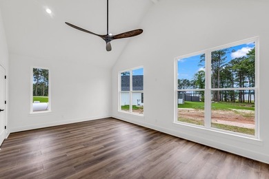 Experience lakeside living at its finest in this stunning new - photo 11