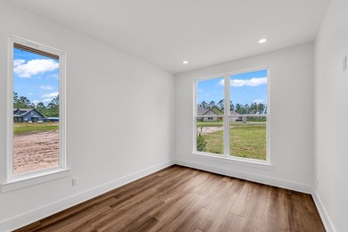 Experience lakeside living at its finest in this stunning new - photo 19