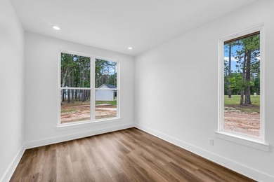 Experience lakeside living at its finest in this stunning new - photo 21
