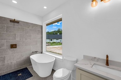 Experience lakeside living at its finest in this stunning new - photo 24