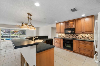 WATERFRONT HOME W/NEW ROOF ON OVERSIZED TIP LOT & EXTREMELY - photo 26