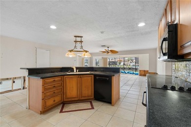 WATERFRONT HOME W/NEW ROOF ON OVERSIZED TIP LOT & EXTREMELY - photo 27