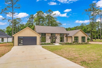 Experience lakeside living at its finest in this stunning new - photo 36