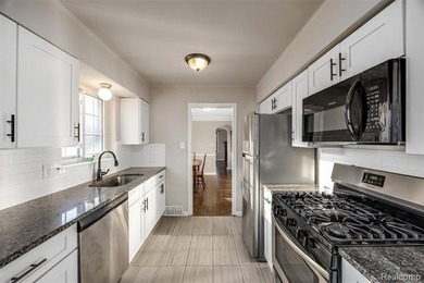 Welcome Home ! This brick bungalow offers an oversized primary - photo 4