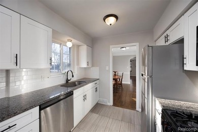 Welcome Home ! This brick bungalow offers an oversized primary - photo 5