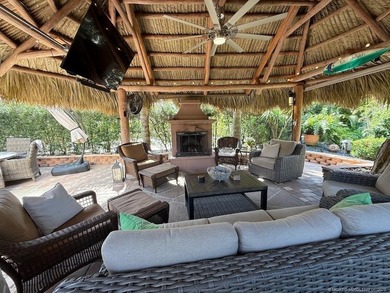 YOUR TROPICAL OASIS AWAITS! Ideally situated near the north - photo 12