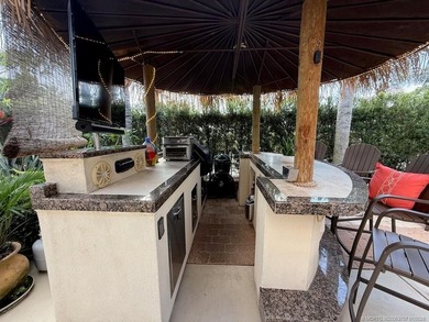 YOUR TROPICAL OASIS AWAITS! Ideally situated near the north - photo 16