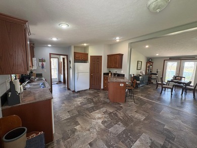Nestled on 1.5 beautifully maintained acres, this charming 2 - photo 11