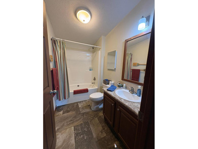 Nestled on 1.5 beautifully maintained acres, this charming 2 - photo 16