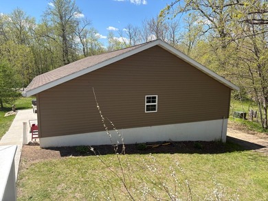 Nestled on 1.5 beautifully maintained acres, this charming 2 - photo 36