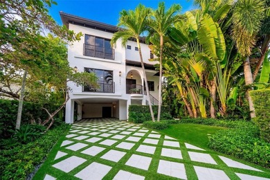 Completely renovated in 2025, this gated three-story residence - photo 1