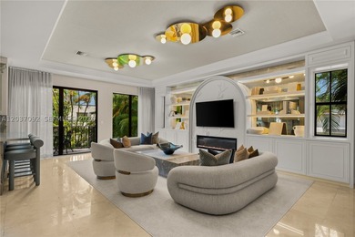 Completely renovated in 2025, this gated three-story residence - photo 3