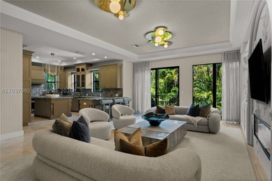 Completely renovated in 2025, this gated three-story residence - photo 5