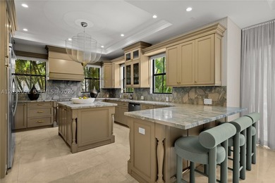 Completely renovated in 2025, this gated three-story residence - photo 6