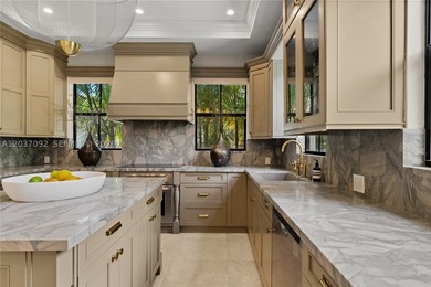 Completely renovated in 2025, this gated three-story residence - photo 7