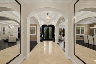 Completely renovated in 2025, this gated three-story residence - photo 8