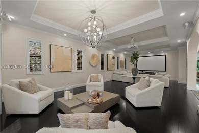 Completely renovated in 2025, this gated three-story residence - photo 9