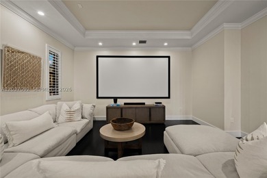 Completely renovated in 2025, this gated three-story residence - photo 10