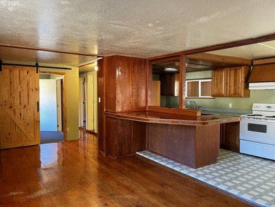 This charming 2-bedroom, 1-bath manufactured home sits on a - photo 11