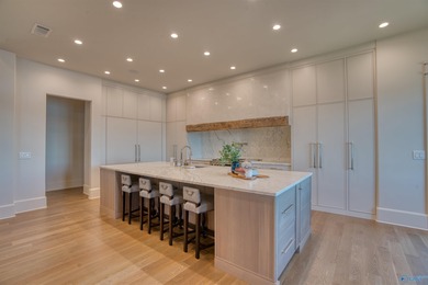 Custom-built home w/ breathtaking lake & mountain views. Open - photo 13