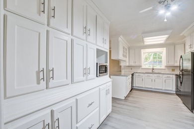 Welcome to this charming 3-bedroom brick ranch nestled on a - photo 15