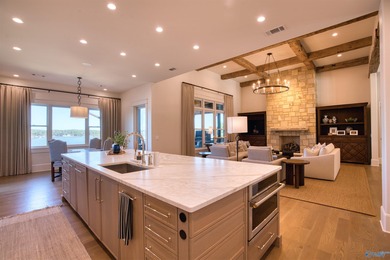 Custom-built home w/ breathtaking lake & mountain views. Open - photo 15