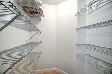 Beautifully maintained 2nd-floor 1-bedroom, 1.5-bath condo with - photo 15