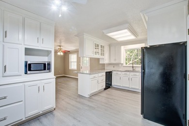 Welcome to this charming 3-bedroom brick ranch nestled on a - photo 17