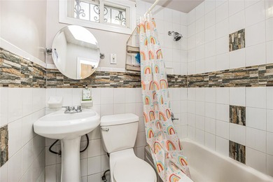 Welcome to 4101 Paulding Avenue, a charming brick single-family - photo 19